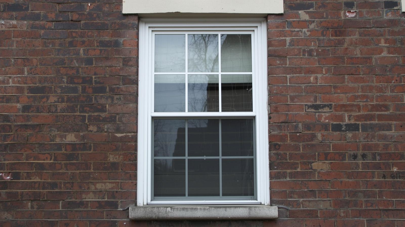 single hung window used in urban apartment building -vigorawindows.com