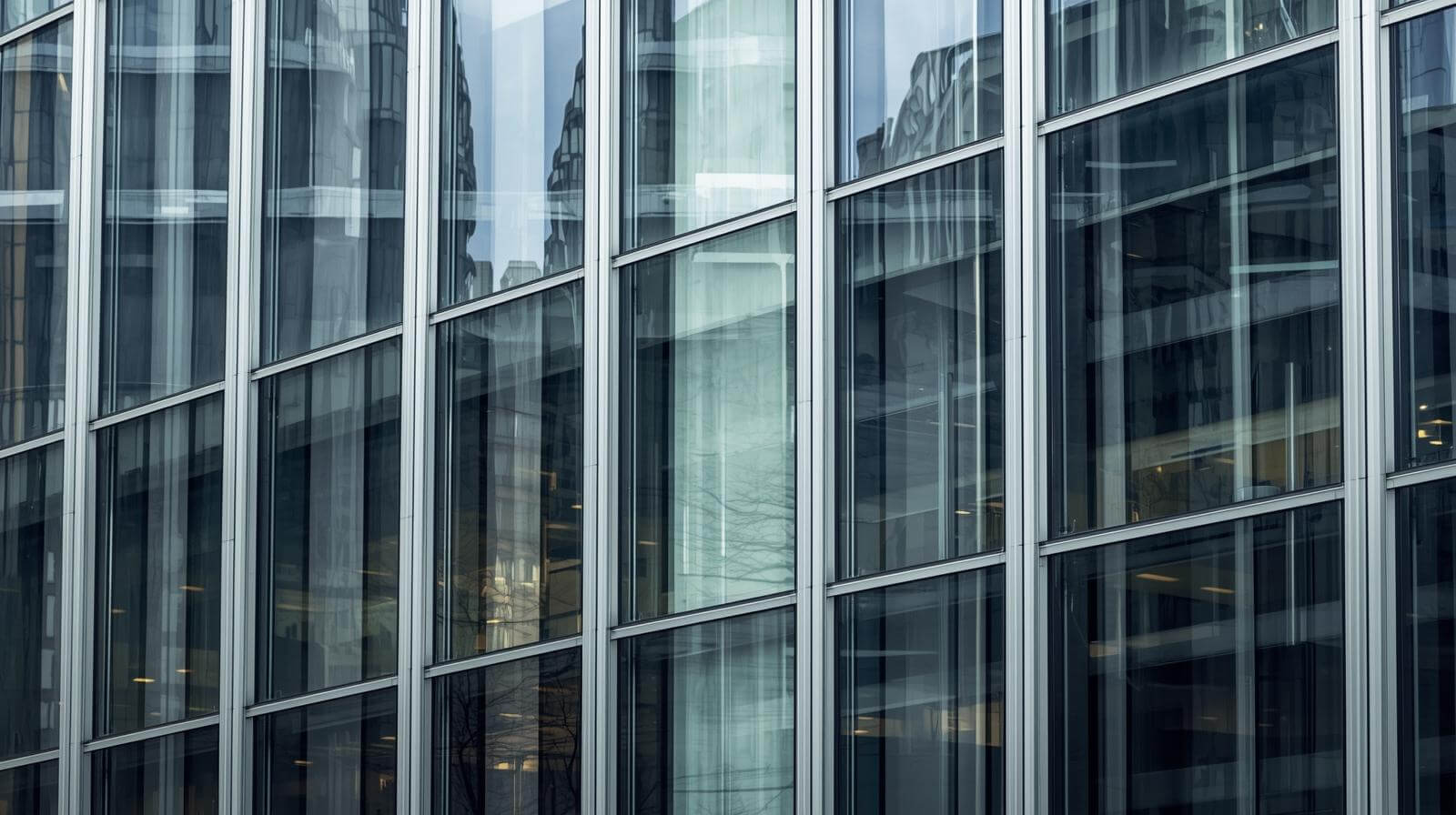 modern building facade featuring large aluminium fixed glass windows with slim frames-vigorawindows.com